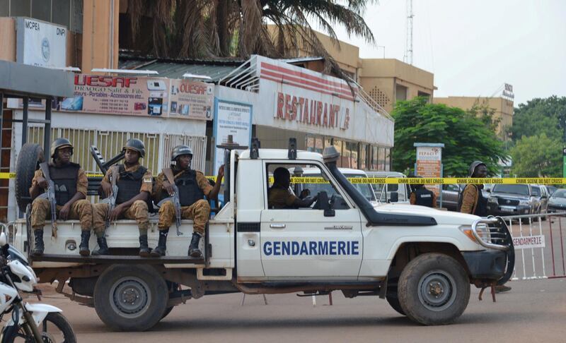 FILE PHOTO: Security forces deploy to secure the area after an overnight attack on a restaurant in the Burkina Faso capital Ouagadougou, August 14, 2017. REUTERS/Hamany Daniex/File Photo
