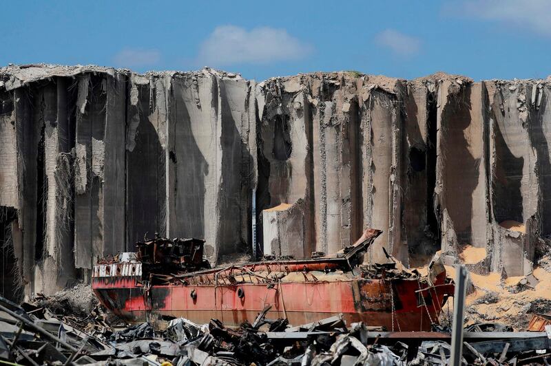 A picture taken during an origanized media tour on August 26, 2020 shows Lebanon's main grain silo severely damaged at the port of Beirut following a massive explosion earlier this month. / AFP / JOSEPH EID
