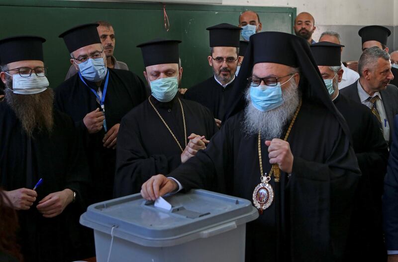 Greek Orthodox Patriarch of Antioch and All East John X Yazigi casts his vote in Damascus. Reuters