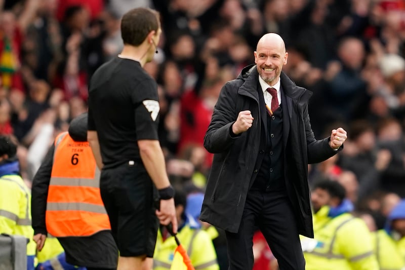 Manchester United coach Erik ten Hag celebrates on the touchline. AP