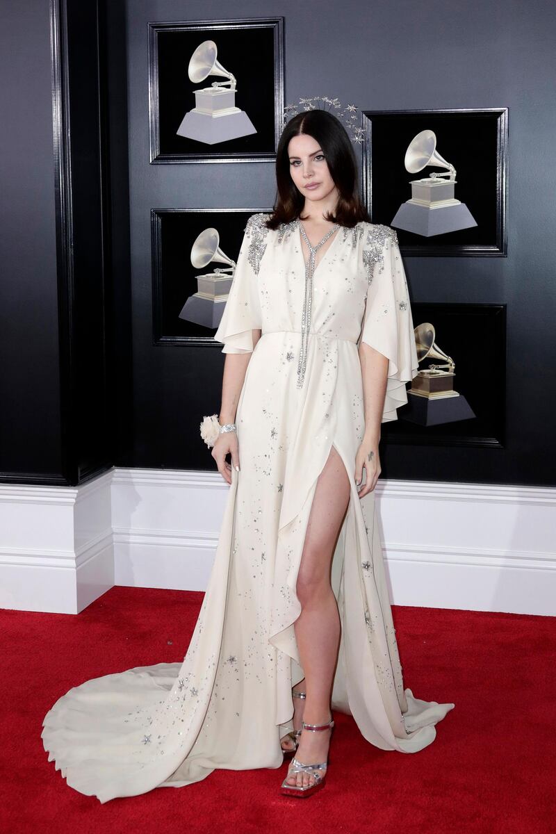 Lana Del Rey opted for a vintage-feel Gucci gown (custom) - we love the mid-length draped sleeves. Jason Szenes / EPA