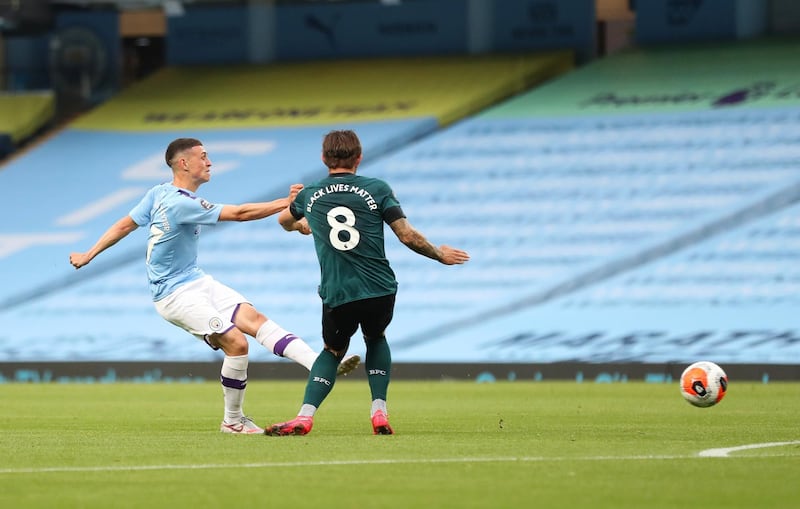 Phil Foden scores Manchester City first goal against Burnley. Getty Images