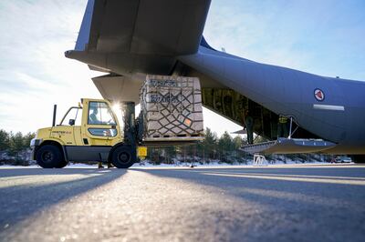 Norwegian M72 anti-tank missiles are loaded on a transport plane for delivery to Ukraine, in Oslo. AP
