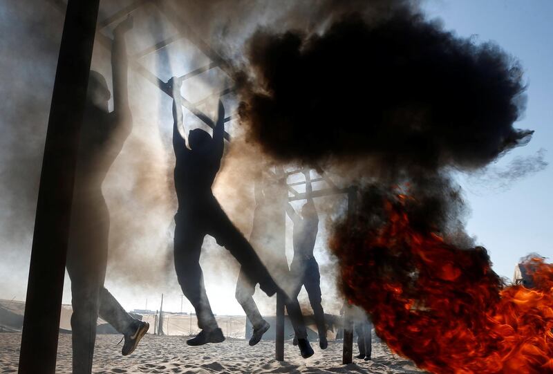 Palestinian cadets demonstrate their skills at a police college run by the Hamas-led interior ministry, in Khan Younis in the southern Gaza Strip. Mohammed Salem/Reuters