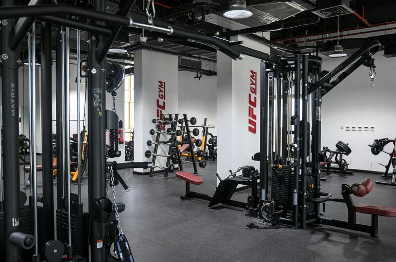 Abu Dhabi, United Arab Emirates - The cardio and strength training room on the second level, at the newly opened UFC Gym in Mohammed Bin Zayed City. Khushnum Bhandari for The National