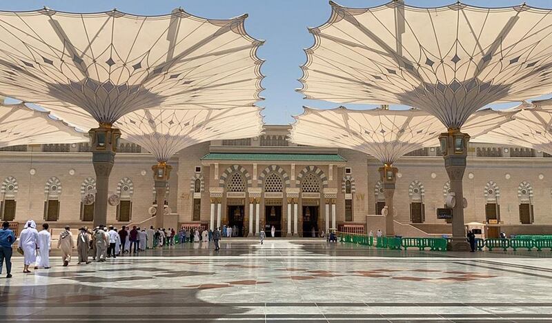 Muslim worshippers arrive for noon prayer at the Prophet's mosque in Saudi Arabia's holy city of Madinah.  AFP