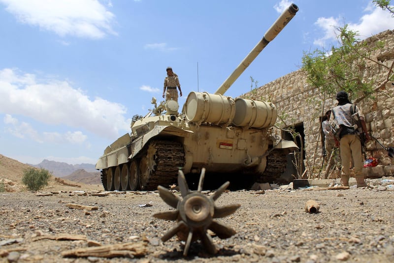 (FILES) In this file photo taken on April 07, 2016 Yemeni pro-government forces, loyal to fugitive President Abedrabbo Mansour Hadi, gather at the military base of Nehm, in the Sanaa province east of the Yemeni capital, the frontline with the Marib region. Saudi Arabia reaffirmed support for a "comprehensive political solution" in Yemen, state media reported early on February 5, 2021 after President Joe Biden ended US support for the kingdom's military campaign in the country. The White House said the previous day that Biden would end his support for the war by Washington's Saudi allies in Yemen, in his first major foreign policy speech. / AFP / Nabil HASAN
