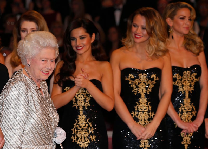 The queen meets Nicola Roberts, Cheryl Cole, Kimberley Walsh and Sarah Harding from pop group Girls Aloud. Getty