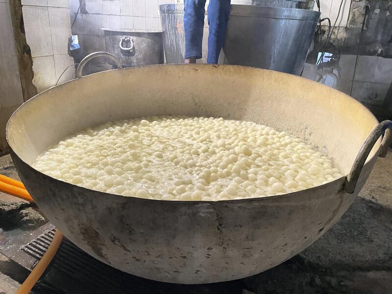 Ash gourd chunks are first soaked in white calcium hydroxide water