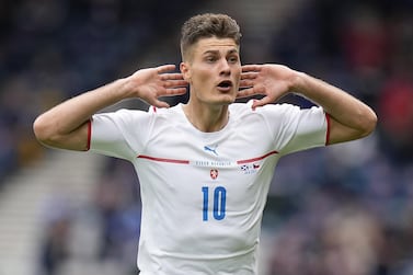 epa09270578 Patrik Schick of the Czech Republic celebrates after scoring his team's second goal during the UEFA EURO 2020 group D preliminary round soccer match between Scotland and the Czech Republic in Glasgow, Britain, 14 June 2021. EPA/Petr Josek / POOL (RESTRICTIONS: For editorial news reporting purposes only. Images must appear as still images and must not emulate match action video footage. Photographs published in online publications shall have an interval of at least 20 seconds between the posting.)