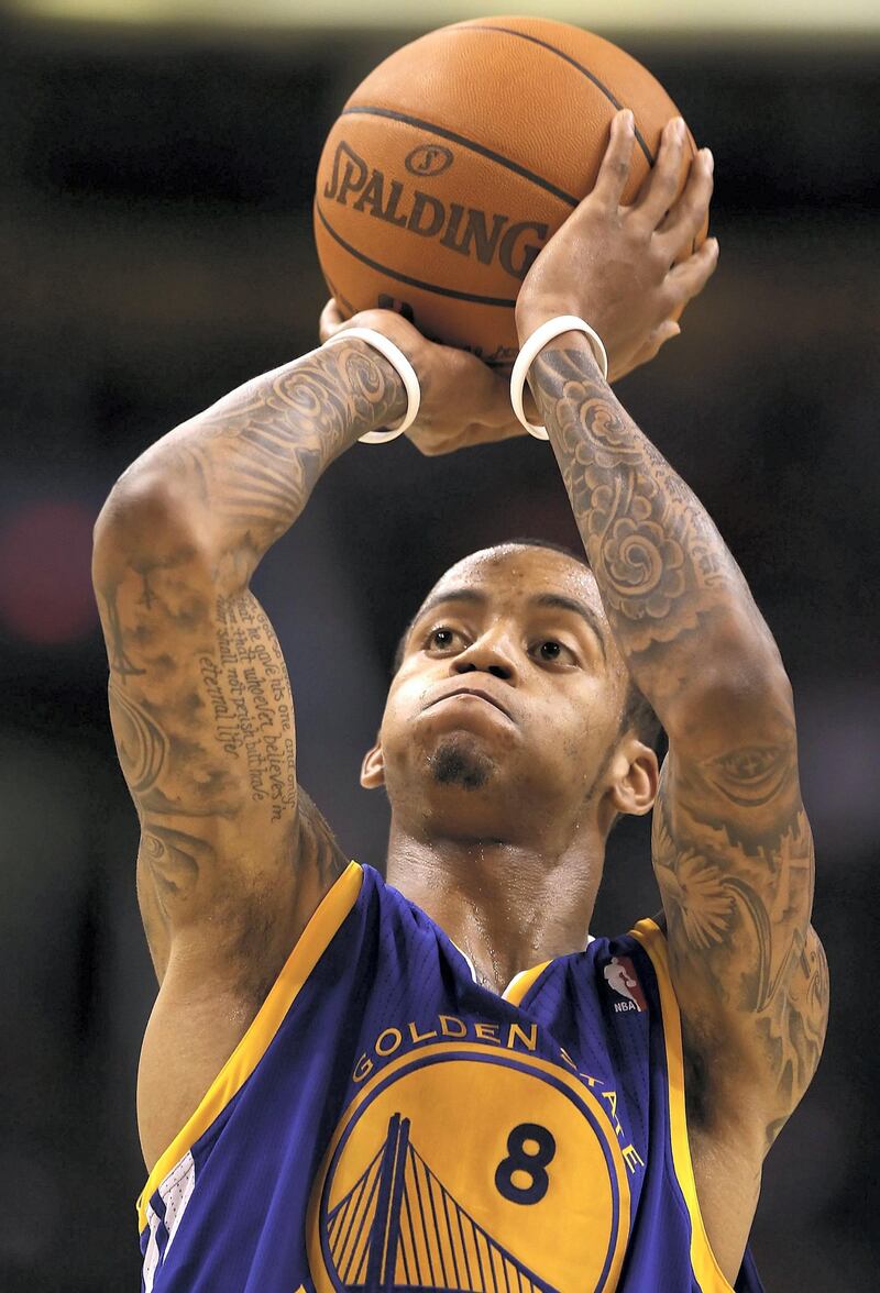 PHOENIX - OCTOBER 19: Monta Ellis #8 of the Golden State Warriors shoots a free throw shot against the Phoenix Suns during the preseason NBA game at US Airways Center on October 19, 2010 in Phoenix, Arizona. NOTE TO USER: User expressly acknowledges and agrees that, by downloading and or using this photograph, User is consenting to the terms and conditions of the Getty Images License Agreement.   Christian Petersen/Getty Images/AFP