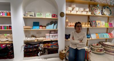 Iraqi entrepreneur Noor Hashim sitting in her store Hili in Babylon mall in central Baghdad. Haider Husseini / The National