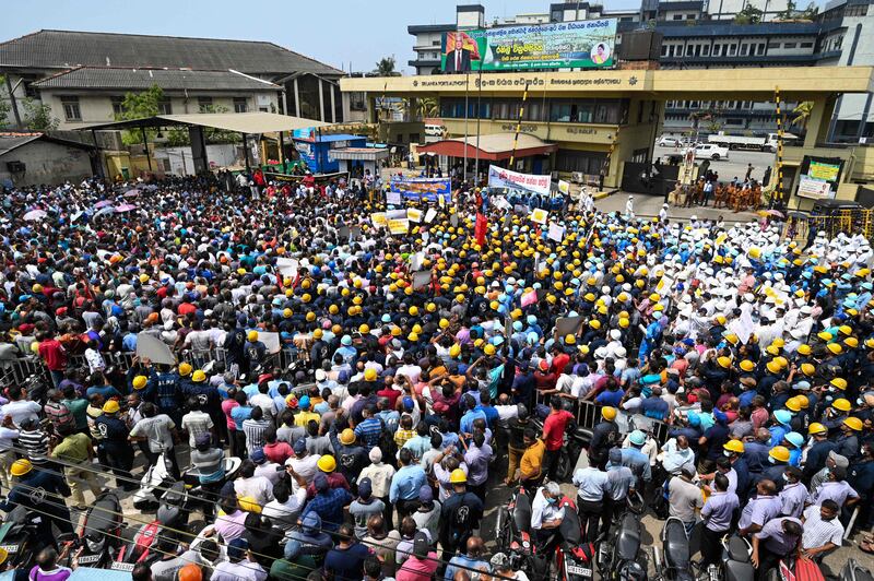 Members of Sri Lanka ports' trade union stage an anti-government protest in Colombo. AFP
