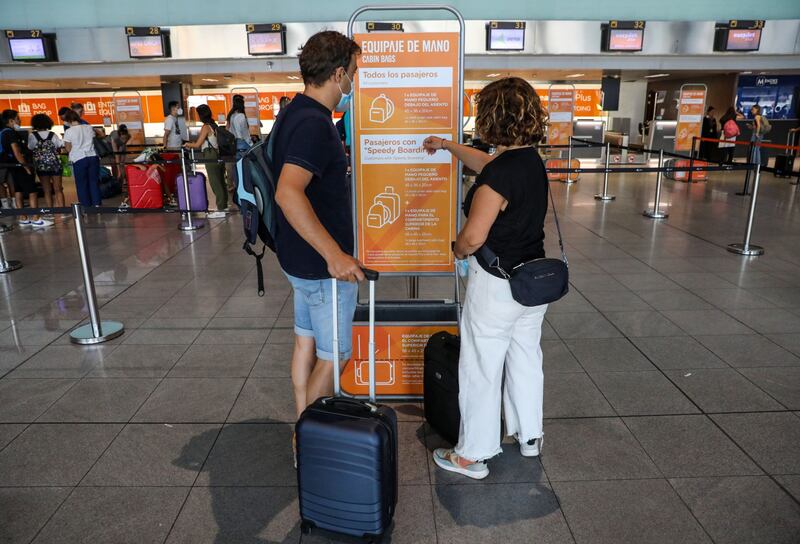 Passengers in the EasyJet check-in area at El Prat airport, in Barcelona, Spain. Bloomberg