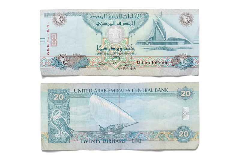 DUBAI, UNITED ARAB EMIRATES. 12 APRIL 2021. United Arab Emirates currency, UAE Money. Twenty Dirham bank note, 20 aed. (Photo: Antonie Robertson/The National) Journalist: Juman Jarallah. Section: National.