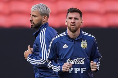 Argentina's Lionel Messi and Sergio Aguerohave won titles for Argentina in age-group football. Carl de Souza / AFP