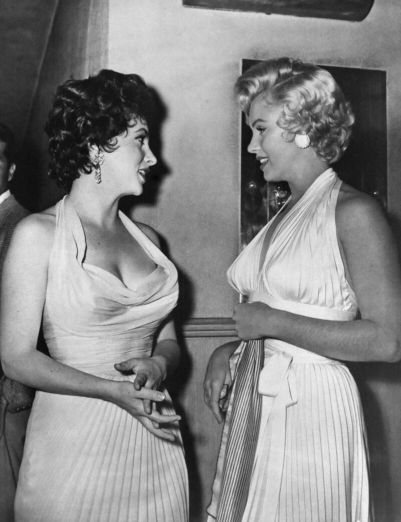 Marilyn Monroe, right, and Lollobrigida in New York in 1954. AFP