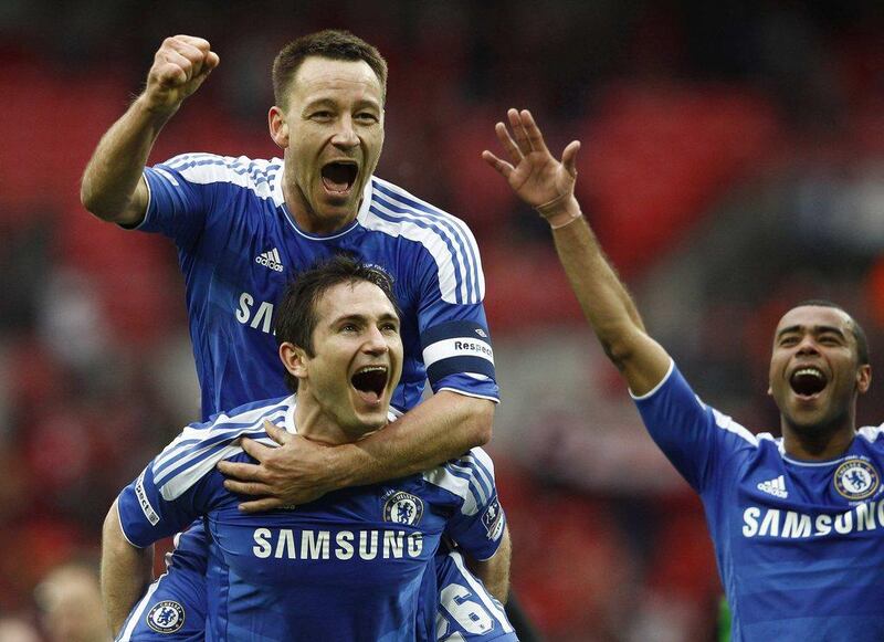 Chelsea's John Terry (top), Frank Lampard (bottom) and Ashley Cole celebrate after defeating Liverpool at Wembley Stadium in London, May 5, 2012. Eddie Keogh / Reuters