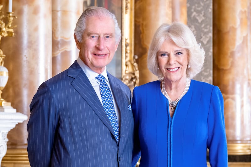 Britain's King Charles III and Queen Consort Camilla pose for a photo at Buckingham Palace. AP