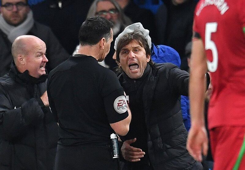 Chelsea manager Antonio Conte is sent to the stands by referee Neil Swarbrick. Andy Rain / EPA