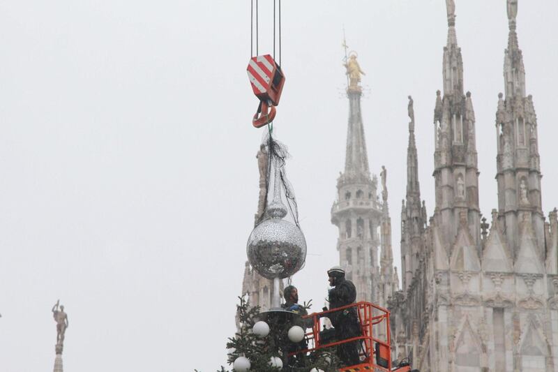 The top of the Christmas tree is intalled in Piazza Duomo quare in Milan. EPA