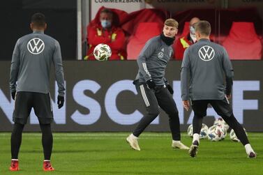 Germany's forward Timo Werner (C) and teammates warm up during a training session ahead of the UEFA Nations League football match between Germany and Ukraine in Leipzig on November 13, 2020. ALTERNATIVE CROP / AFP / Ronny HARTMANN / ALTERNATIVE CROP