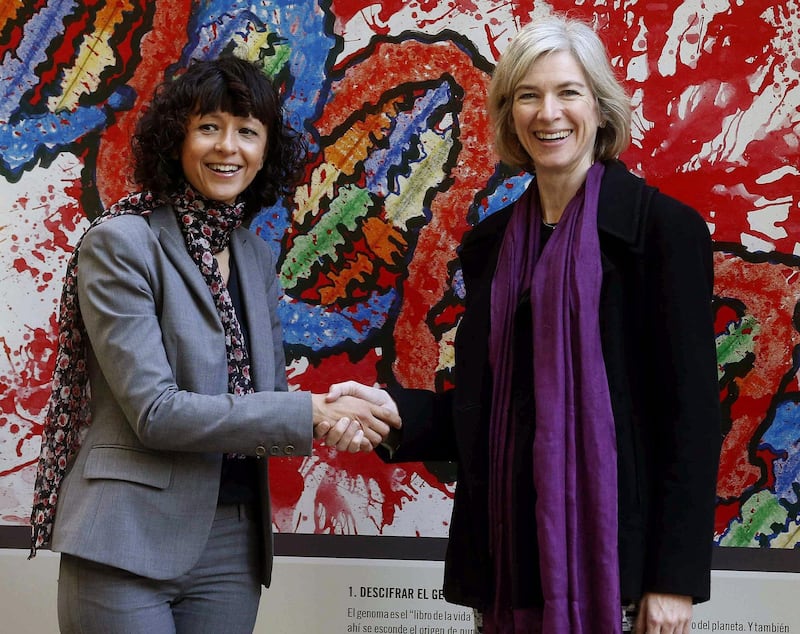 epa08726348 (FILE) - File photo dated on 21 October 2015 of scientists Emmanuelle Charpentier (L) and Jennifer Doudna (R), winners of 2015 Princess of Asturias Prize for Scientific and Technical Investigation, shaking hands during a press conference held in the framework of events organized on the sidelines of Princess of Asturias Prizes awarding ceremony in Oviedo, northern Spain (reissued 07 October 2020). Charpentier and Doudna share the 2020 Nobel price in Chemistry for discovering the CRISPR/Cas9 genetic scissors with which researchers can change the DNA of animals, plants and microorganisms with extremely high precision.  EPA/J.L. Cereijido
