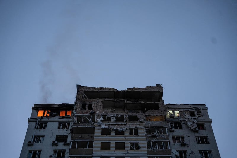 An apartment building burns in Kyiv following the attack. Reuters