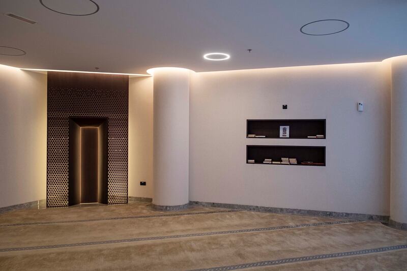 The prayer room in Dubai Design District is fitted with a sleek qibla wall. Antonie Robertson / The National