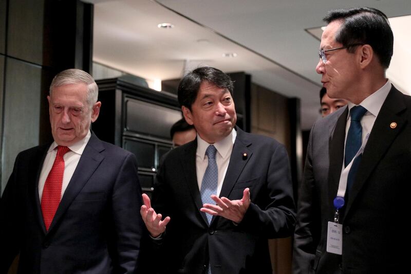 epa06781685 Japanese Defense Minister Itsunori Onodera (C) leaves a trilateral meeting with US Secretary of Defense James Mattis (L), and South Korean National Defense Minister Song Young-moo (R) on the sidelines of a International Institute for Strategic Studies (IISS) 17th Asia Security Summit in Singapore, 03 June 2018. The IISS Asia Security Summit is an annual gathering of defense officials in the Asia-Pacific region and is dubbed the Shangri-La Dialogue in honor of the hotel where the event is held. The summit will be held from 01 to 03 June 2018.  EPA/WALLACE WOON