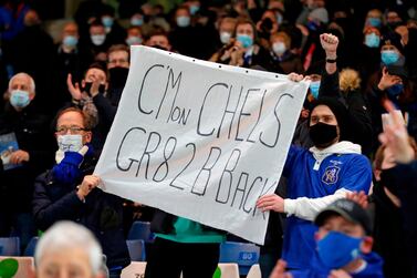 Chelsea fans hold a banner during the English Premier League football match between Chelsea and Leeds United at Stamford Bridge in London on December 5, 2020. RESTRICTED TO EDITORIAL USE. No use with unauthorized audio, video, data, fixture lists, club/league logos or 'live' services. Online in-match use limited to 120 images. An additional 40 images may be used in extra time. No video emulation. Social media in-match use limited to 120 images. An additional 40 images may be used in extra time. No use in betting publications, games or single club/league/player publications. / AFP / POOL / MATTHEW CHILDS / RESTRICTED TO EDITORIAL USE. No use with unauthorized audio, video, data, fixture lists, club/league logos or 'live' services. Online in-match use limited to 120 images. An additional 40 images may be used in extra time. No video emulation. Social media in-match use limited to 120 images. An additional 40 images may be used in extra time. No use in betting publications, games or single club/league/player publications.