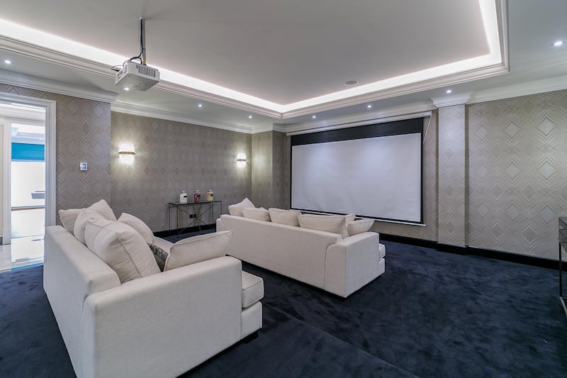 <p>A private cinema room is located downstairs.&nbsp;Courtesy LuxuryProperty.com</p>
