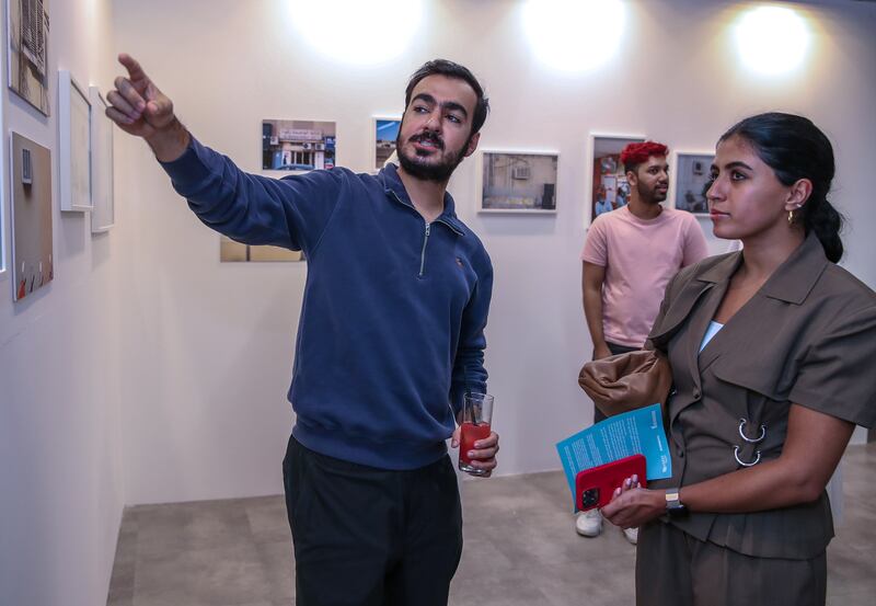 Bahraini photographer Ahmed Al Kuwaiti explains his work. Victor Besa / The National