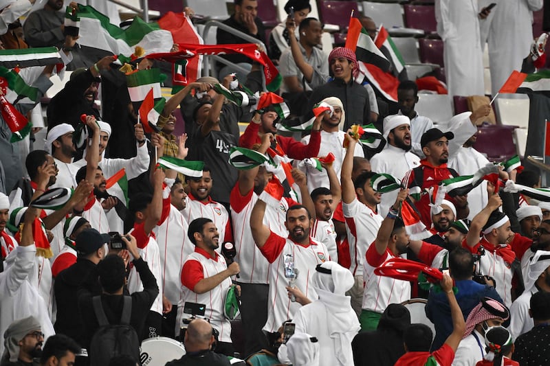 UAE fans celebrate their team's third goal during the Qatar 2023 AFC Asian Cup Group C football match between United Arab Emirates and Hong Kong. AFP

