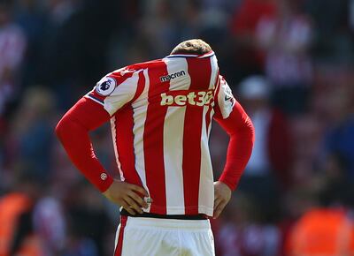Stoke City's Xherdan Shaqiri reacts after Stoke City are relegated, following the English Premier League soccer match between Stoke City and Crystal Palace, at the bet365 Stadium, in Stoke, England, Saturday May 5, 2018. (Dave Thompson/PA via AP)