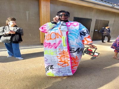 Wearing a home-made coat from a mattress topper and spray paint, outside Chanel. Sarah Maisey / The National