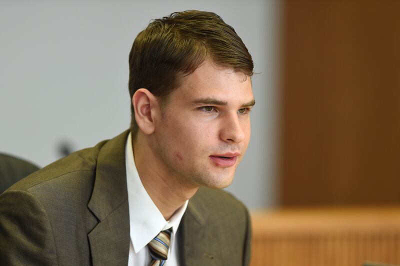 FILE - Nathan Carman speaks at a hearing in probate court, Tuesday, Aug.  7, 2018, in West Hartford, Conn.  Carman, who was found floating on a raft in the ocean off the coast of Rhode Island in 2016 after his boat sank, has been indicted on charges alleging he killed his mother at sea to inherit the family's estate, according to the indictment unsealed Tuesday, May 10, 2022.  (Cloe Poisson / Hartford Courant via AP, Pool, File)