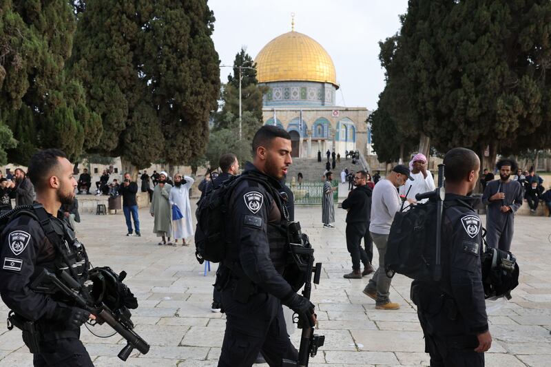 Israeli security forces escort Jewish visitors at the Al Aqsa mosque compound in Jerusalem. AFP