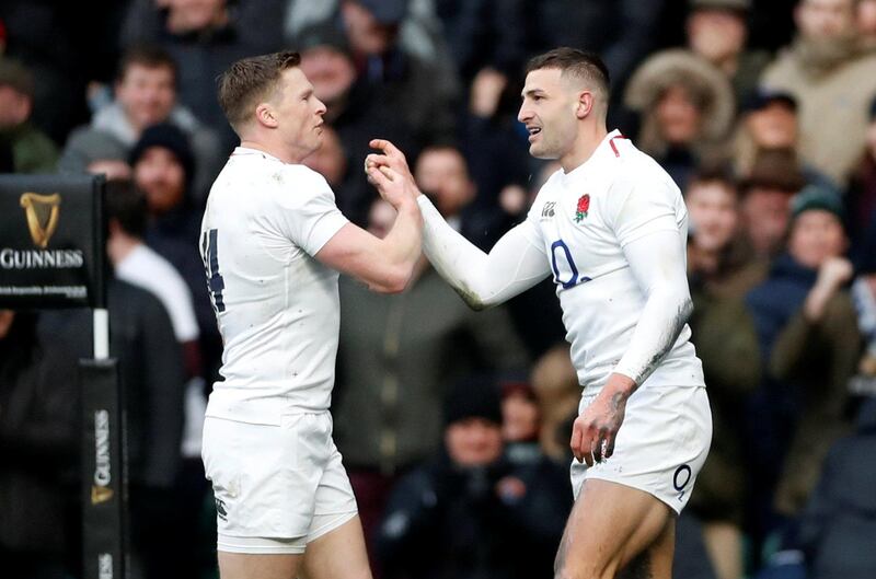 Rugby Union - Six Nations Championship - England v France - Twickenham Stadium, London, Britain - February 10, 2019  England's Jonny May celebrates scoring their third try to complete his hat-trick with Chris Ashton   Action Images via Reuters/Matthew Childs