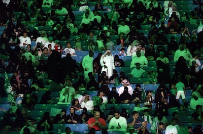Saudi families arrive at a stadium to attend an event in the capital Riyadh on September 23, 2017 commemorating the anniversary of the founding of the kingdom.
The national day celebration coincides with a crucial time for Saudi Arabia, which is in a battle for regional influence with arch-rival Iran, bogged down in a controversial military intervention in neighbouring Yemen and at loggerheads with fellow US Gulf ally Qatar. / AFP PHOTO / Fayez Nureldine