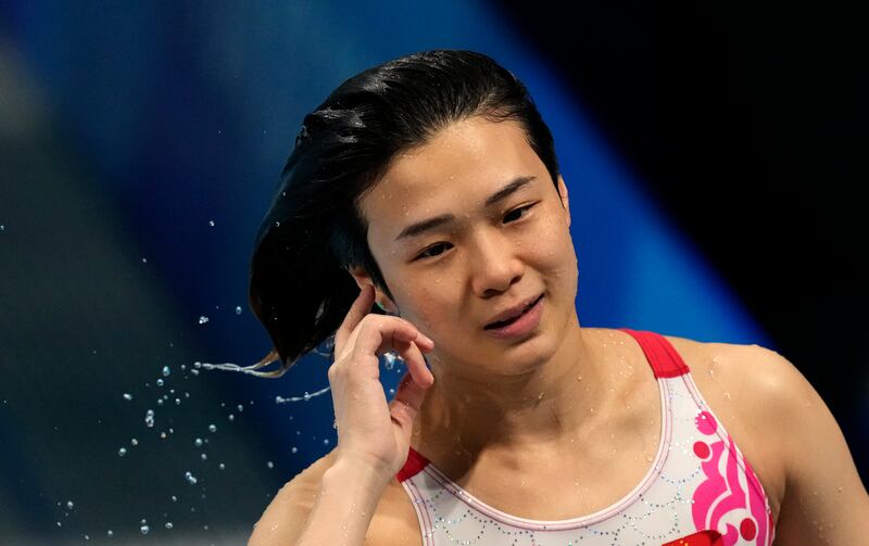 Shi Tingmao of China after winning gold medal in women's diving 3m springboard.