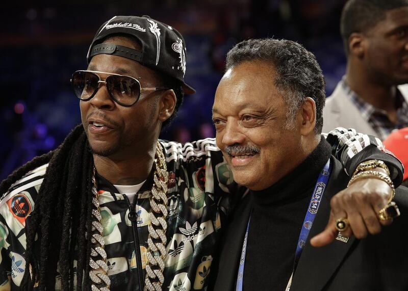 Singer 2 Chainz, left, poses for a photo with the Rev. Jesse Jackson Sr, after the skills competition. Gerald Herbert / AP photo
