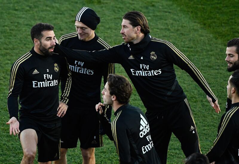 Left to right: Dani Carvajal, Toni Kroos and Sergio Ramos. AFP