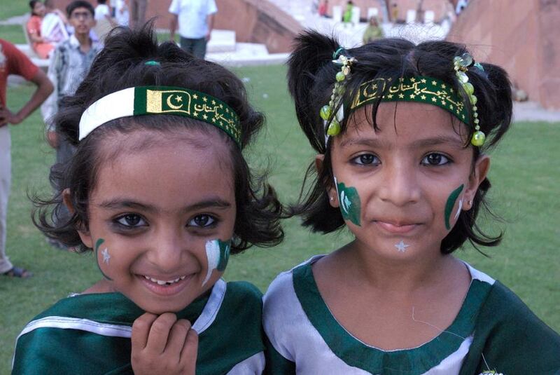 Local Lahori children enjoy a festival located often on the streets of the city, Lahore, Pakistan,by Matthew Tabaccos for The National.21.12.08
