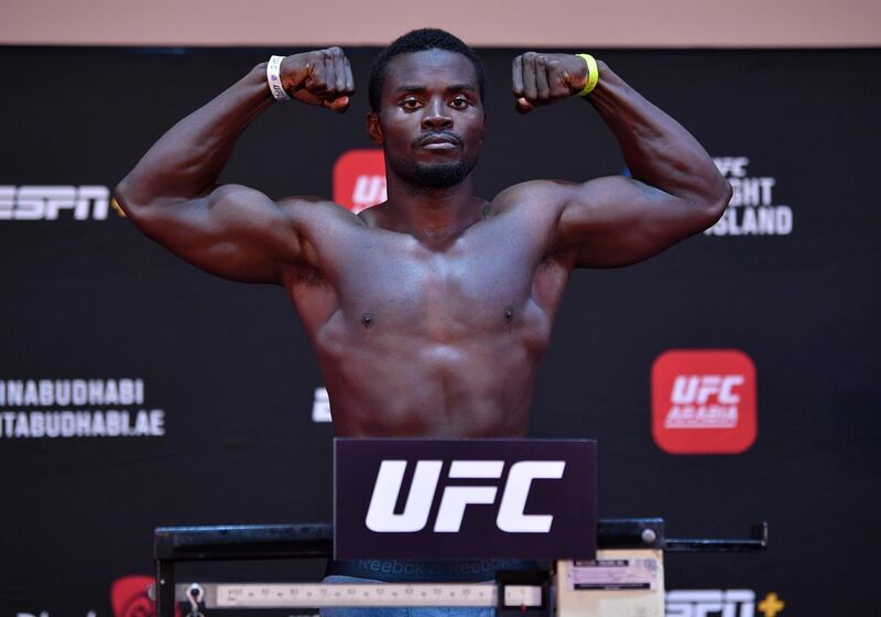 ABU DHABI, UNITED ARAB EMIRATES - JULY 14: Abdul Razak Alhassan of Ghana poses on the scale during the UFC Fight Night weigh-in inside Flash Forum on UFC Fight Island on July 14, 2020 in Yas Island, Abu Dhabi, United Arab Emirates. (Photo by Jeff Bottari/Zuffa LLC via Getty Images)