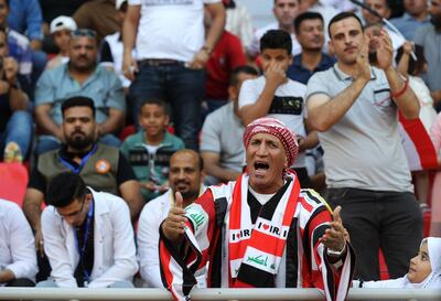 Iraqi fans watch the AFC Cup football match between Iraq's Al-Zawraa club and Bahrain's Manama club at the Karbala Sports City stadium on April 16, 2018.
Iraq recently started hosting foreign football clubs for competitive matches for the first time in decades, after FIFA gave the go-ahead for games to resume.





 / AFP PHOTO / AHMAD AL-RUBAYE