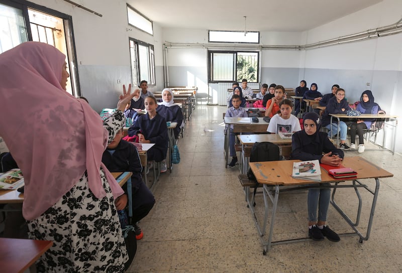 Ms Koteich, 44, has taught French literature at Lebanese public schools for exactly half her lifetime. 'We used to get a salary high enough that I could afford to put them [her children] in private school,' she said.