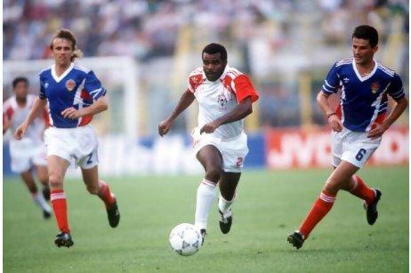 UAE's Khaleel Mubarak moves forward with the ball in between two Yugoslav players in the 1990 World Cup Finals, in Bologna, Italy, in June, 1990. Yugoslavia 4 beat the United Arab Emirates 1.