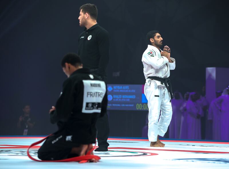 UAE's Khaled Al Shehi, white, after his loss to Brazilian Meyran Alves in the 62kg division