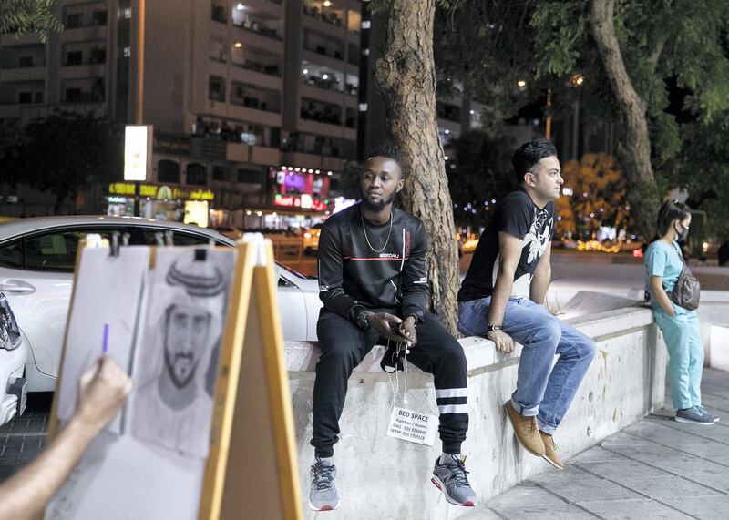 DUBAI, UNITED ARAB EMIRATES. 12 MAY 2020. 
Binyamin, an artist, draws portraits on Al Rigga Street.
(Photo: Reem Mohammed/The National)

Reporter:
Section: